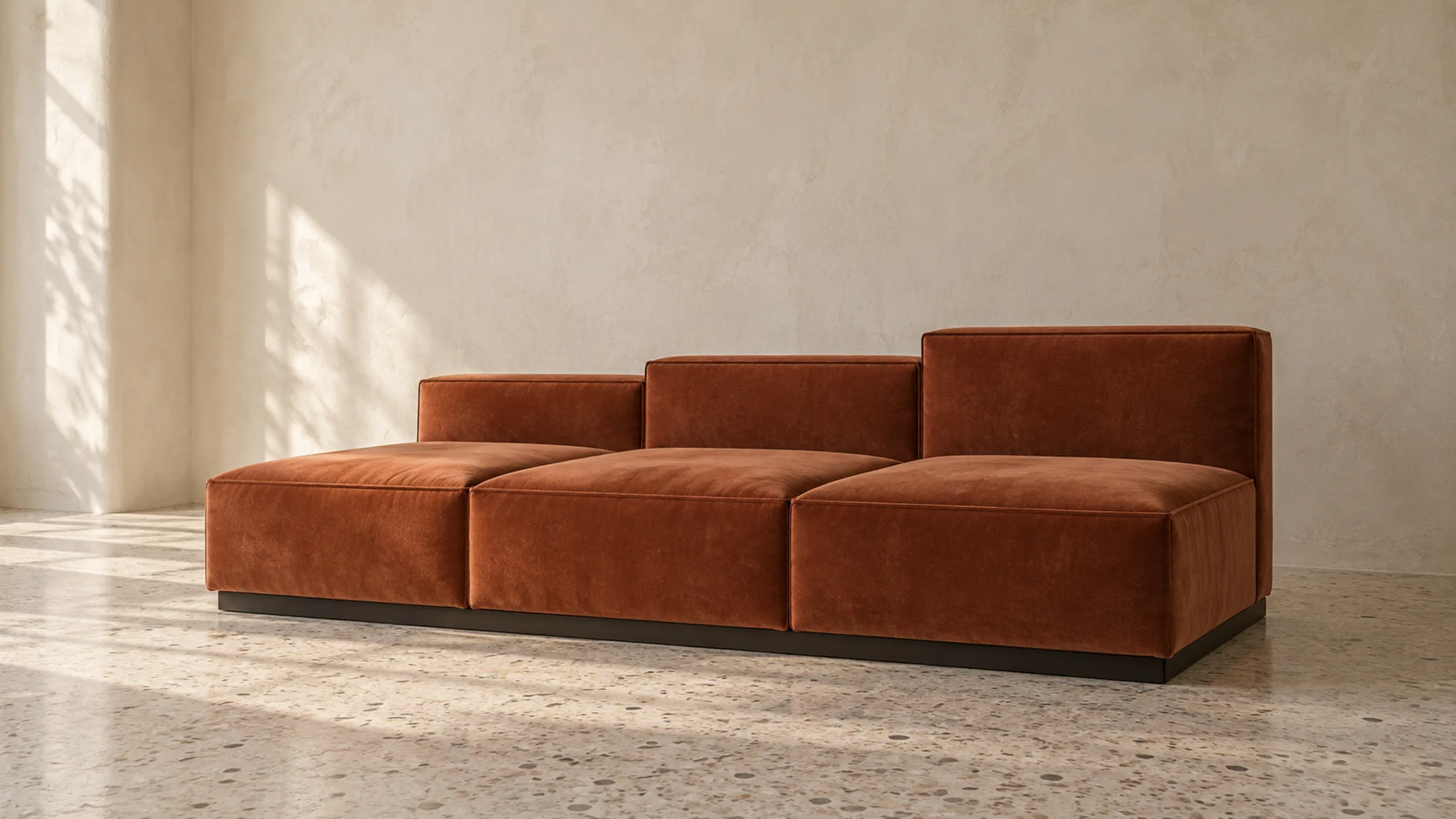 CRASSULA: terracotta velvet platform sofa with stepped backs